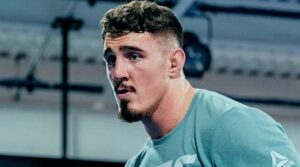 Том Аспинэлл